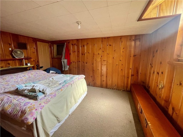 130 W 2nd St, Clearmont, MO 64431 - carpeted bedroom with wood walls