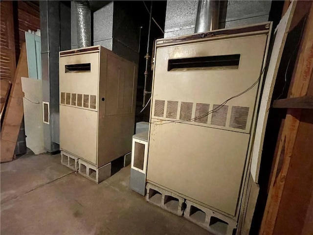 130 W 2nd St, Clearmont, MO 64431 - utility room featuring heating unit