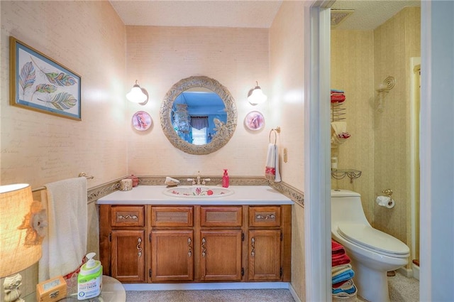 1924 E Sleepy Hollow Dr, Olathe, KS 66062 - bathroom featuring vanity and wallpapered walls
