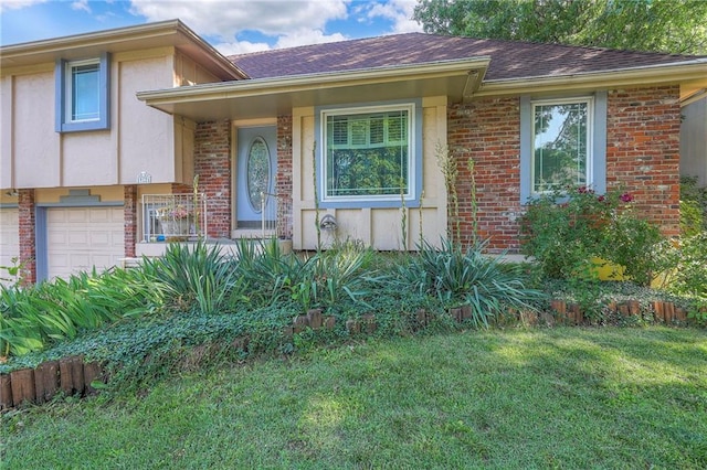 1924 E Sleepy Hollow Dr, Olathe, KS 66062 - view of front facade with brick siding, a front lawn, an attached garage, and a shingled roof