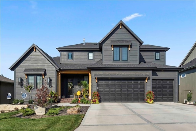 11594 S Zarda Dr, Olathe, KS 66061 - view of front facade featuring driveway and a garage