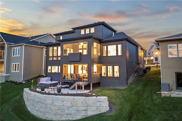 11594 S Zarda Dr, Olathe, KS 66061 - rear view of property with a patio, a balcony, and a yard