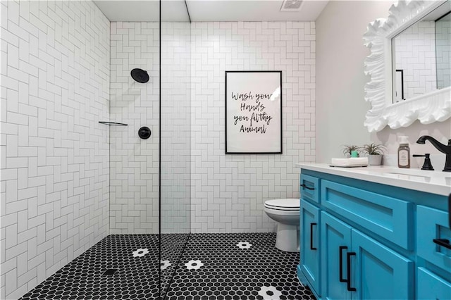 11594 S Zarda Dr, Olathe, KS 66061 - full bathroom featuring vanity, a walk in shower, and tile patterned floors
