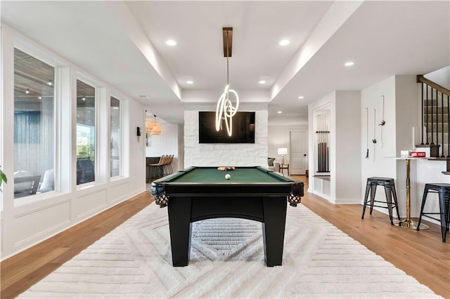 11594 S Zarda Dr, Olathe, KS 66061 - rec room with light wood-type flooring, billiards table, a tray ceiling, and recessed lighting