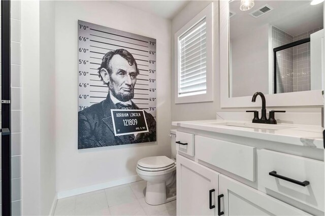 11594 S Zarda Dr, Olathe, KS 66061 - bathroom featuring vanity and a tile shower