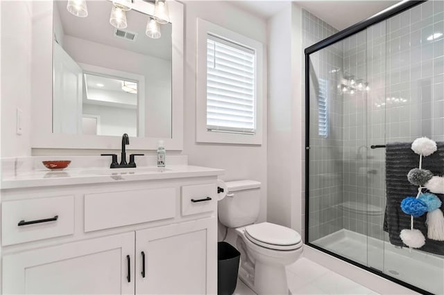 11594 S Zarda Dr, Olathe, KS 66061 - bathroom with vanity, a stall shower, and tile patterned flooring