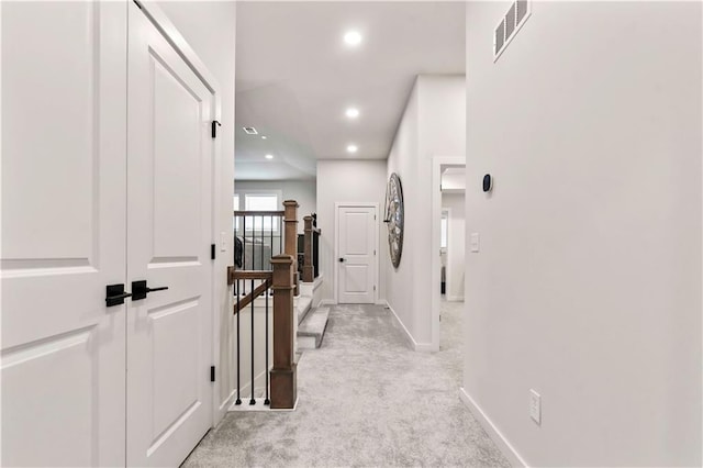 11594 S Zarda Dr, Olathe, KS 66061 - hallway featuring light carpet and recessed lighting