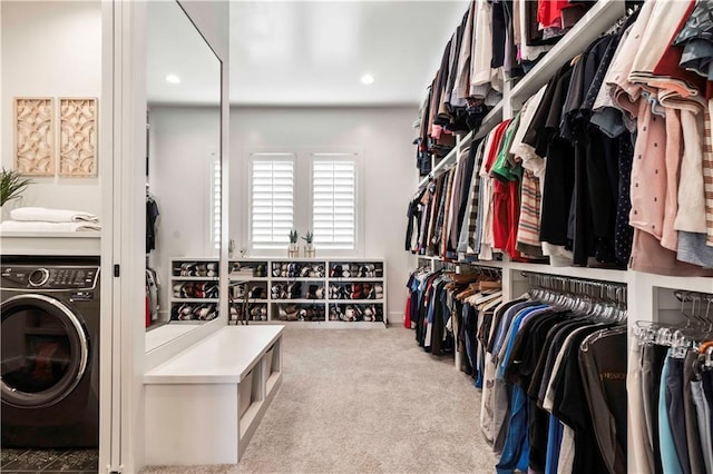 11594 S Zarda Dr, Olathe, KS 66061 - spacious closet with washer / clothes dryer and carpet floors