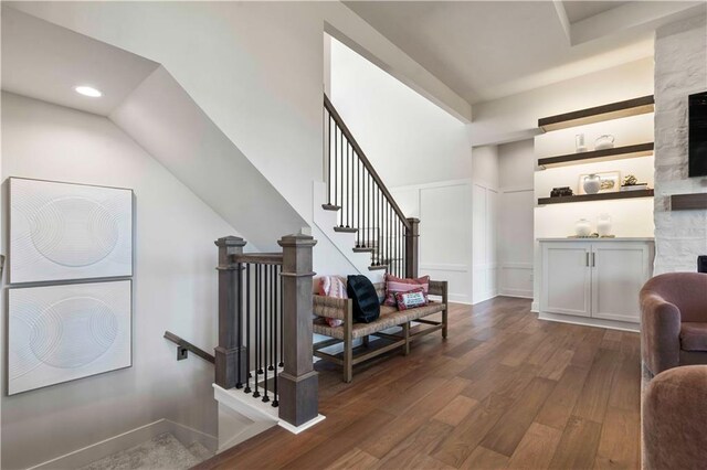 11594 S Zarda Dr, Olathe, KS 66061 - staircase featuring wood finished floors, a fireplace, and recessed lighting