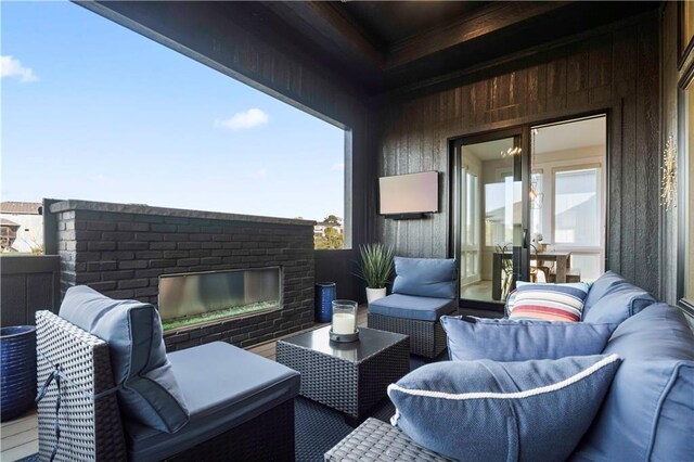 11594 S Zarda Dr, Olathe, KS 66061 - view of patio with an outdoor living space with a fireplace and french doors