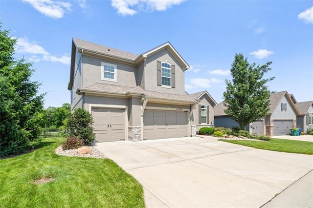 13428 W 172nd St, Overland Park, KS 66221 - view of front of property with stucco siding, a garage, concrete driveway, a front lawn, and stone siding