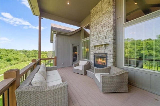 13428 W 172nd St, Overland Park, KS 66221 - deck with an outdoor living space with a fireplace
