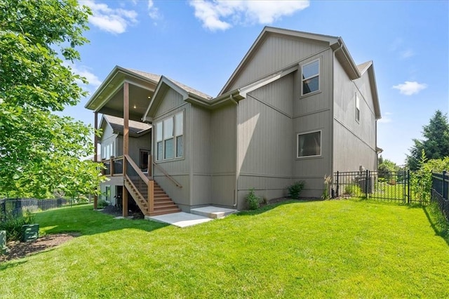 13428 W 172nd St, Overland Park, KS 66221 - back of house featuring a fenced backyard and stairs