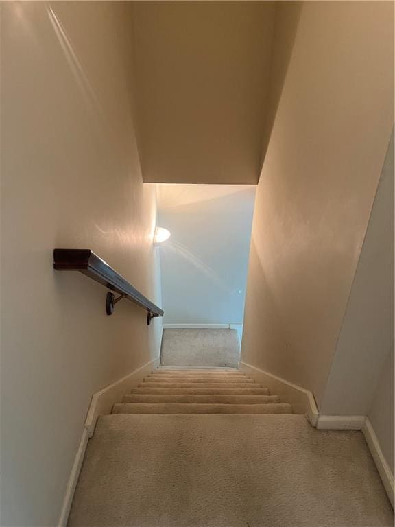 13108 Windsor Cir, Leawood, KS 66209 - stairs featuring carpet flooring and baseboards