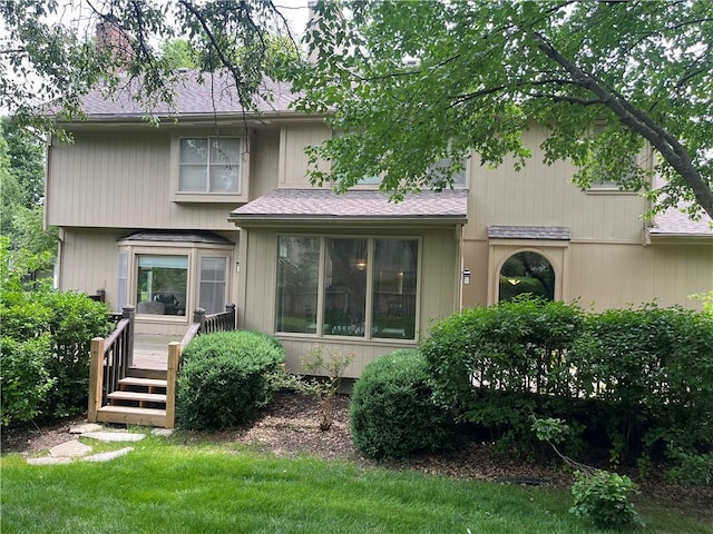 13108 Windsor Cir, Leawood, KS 66209 - rear view of house with a deck and roof with shingles