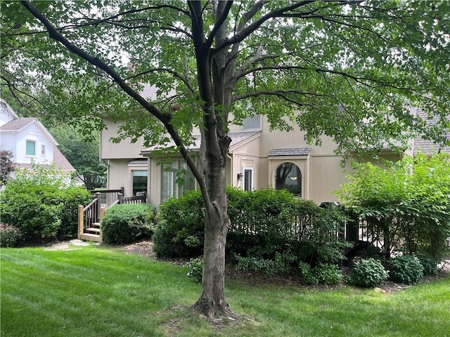 13108 Windsor Cir, Leawood, KS 66209 - view of front of house with a front yard and a deck