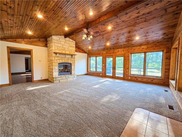 2359 Gp Rd, Ks, KS 66850 - unfurnished living room with a ceiling fan, wooden ceiling, carpet, vaulted ceiling, and a stone fireplace
