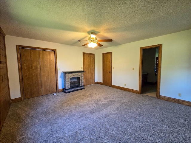 2359 Gp Rd, Ks, KS 66850 - unfurnished living room with ceiling fan, carpet flooring, a fireplace, and a textured ceiling
