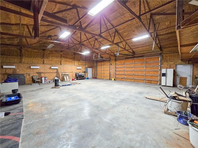 2359 Gp Rd, Ks, KS 66850 - garage with white fridge with ice dispenser