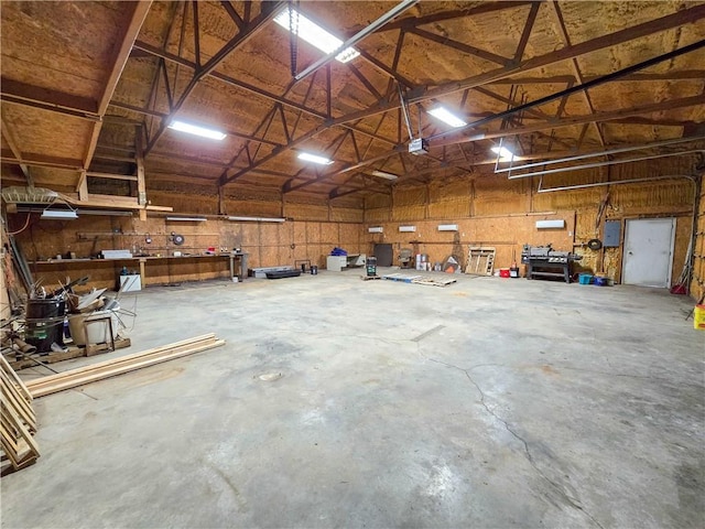 2359 Gp Rd, Ks, KS 66850 - garage featuring a workshop area and a garage door opener