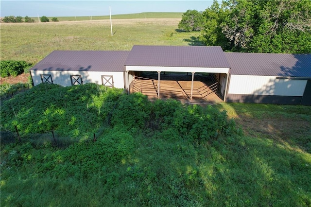 2359 Gp Rd, Ks, KS 66850 - view of front of house featuring a metal roof, a pole building, an outdoor structure, and a front lawn