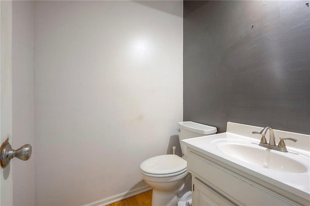 9705 N Virginia Ave, Kansas City, MO 64155 - bathroom with vanity and wood finished floors