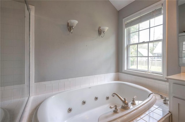 9705 N Virginia Ave, Kansas City, MO 64155 - full bathroom featuring plenty of natural light, a whirlpool tub, and vanity