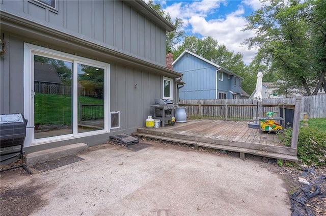 9705 N Virginia Ave, Kansas City, MO 64155 - deck featuring a grill and a patio