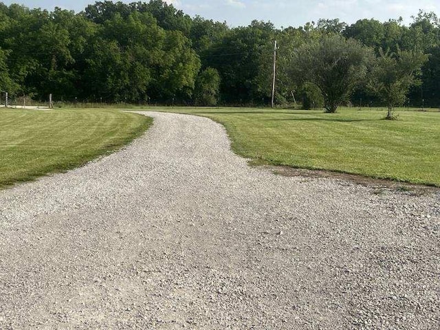 3632 SE 228th St, Lathrop, MO 64465 - view of street with a wooded view