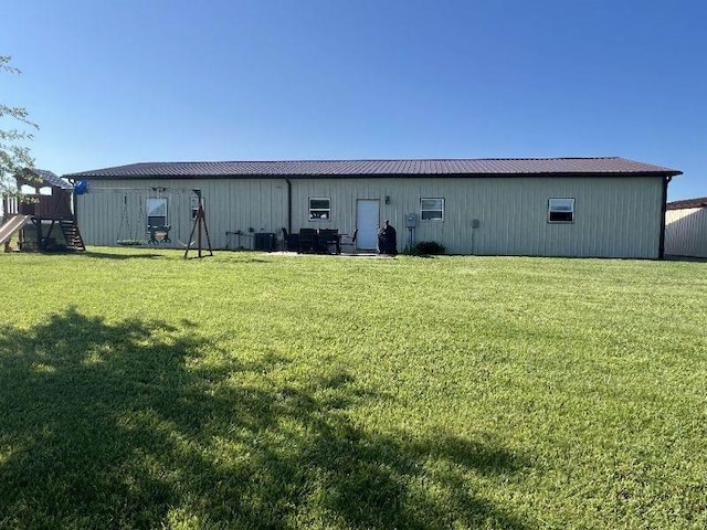 3632 SE 228th St, Lathrop, MO 64465 - rear view of property with a yard and a metal roof