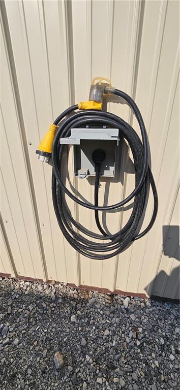 3632 SE 228th St, Lathrop, MO 64465 - exterior view of electric vehicle charger