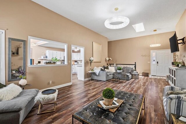 6809 W 156th St, Overland Park, KS 66223 - living room with a skylight and wood finished floors