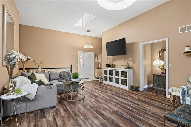 6809 W 156th St, Overland Park, KS 66223 - living room with a skylight, wood finished floors, and high vaulted ceiling