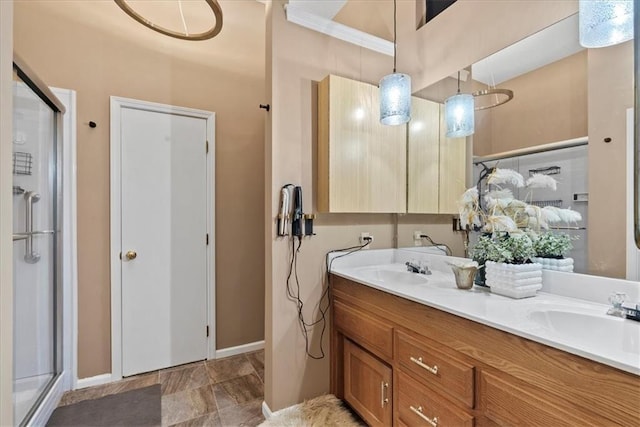 6809 W 156th St, Overland Park, KS 66223 - full bath with double vanity, a shower stall, stone finish floors, and ornamental molding