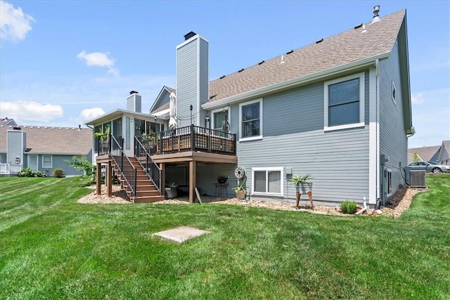 6809 W 156th St, Overland Park, KS 66223 - back of house with a deck, stairway, a yard, and a chimney