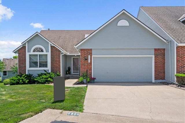 6809 W 156th St, Overland Park, KS 66223 - traditional-style house with a garage, brick siding, driveway, a front lawn, and roof with shingles