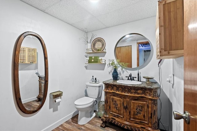6809 W 156th St, Overland Park, KS 66223 - bathroom with a drop ceiling, vanity, and wood finished floors