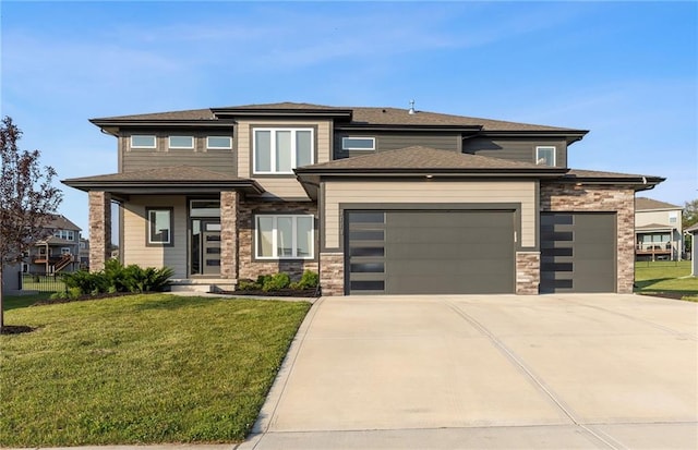 3113 SW Arboridge Dr, Lees Summit, MO 64081 - prairie-style house featuring an attached garage, driveway, stone siding, and a front yard