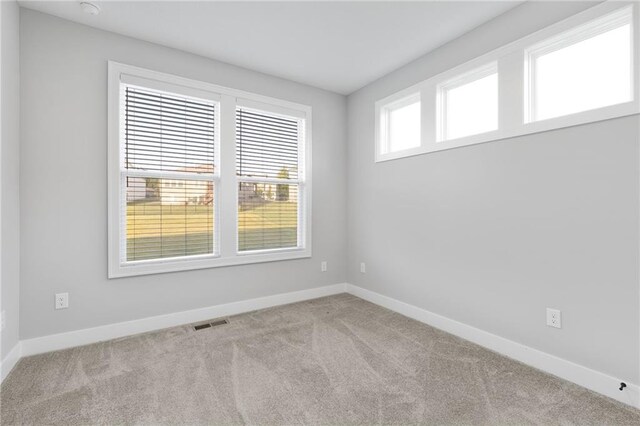 3113 SW Arboridge Dr, Lees Summit, MO 64081 - spare room featuring baseboards and carpet floors