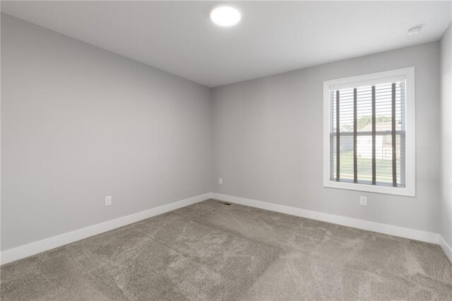 3113 SW Arboridge Dr, Lees Summit, MO 64081 - carpeted empty room featuring baseboards and a smoke detector