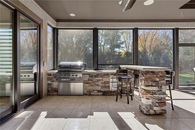 14713 Ash St, Leawood, KS 66224 - view of patio / terrace with an outdoor kitchen, a bar, and ceiling fan