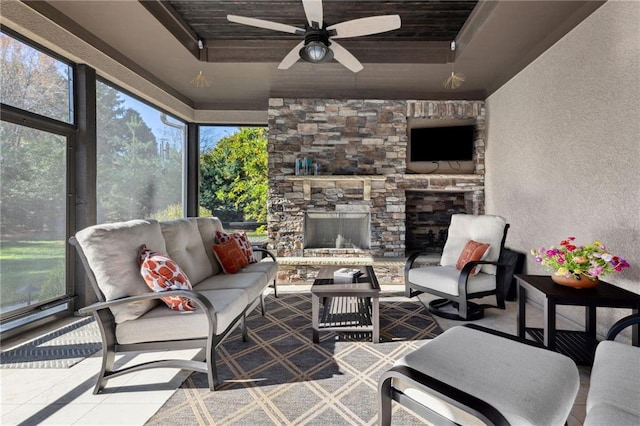 14713 Ash St, Leawood, KS 66224 - sunroom featuring a ceiling fan and an outdoor living space with a fireplace