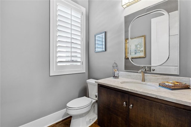 14713 Ash St, Leawood, KS 66224 - bathroom with vanity and toilet