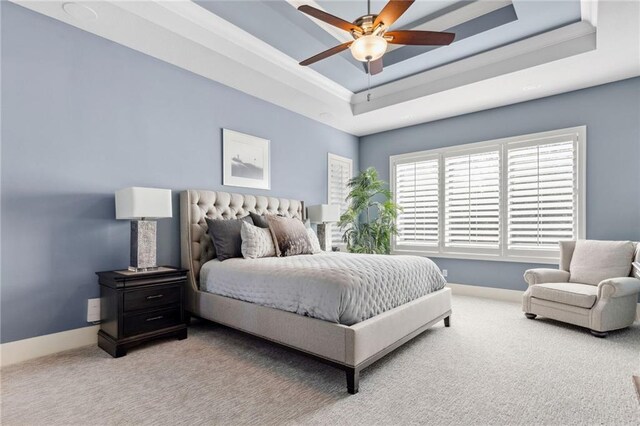 14713 Ash St, Leawood, KS 66224 - bedroom with carpet floors, a tray ceiling, and a ceiling fan