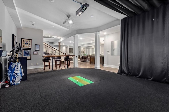 14713 Ash St, Leawood, KS 66224 - exercise room with decorative columns and recessed lighting