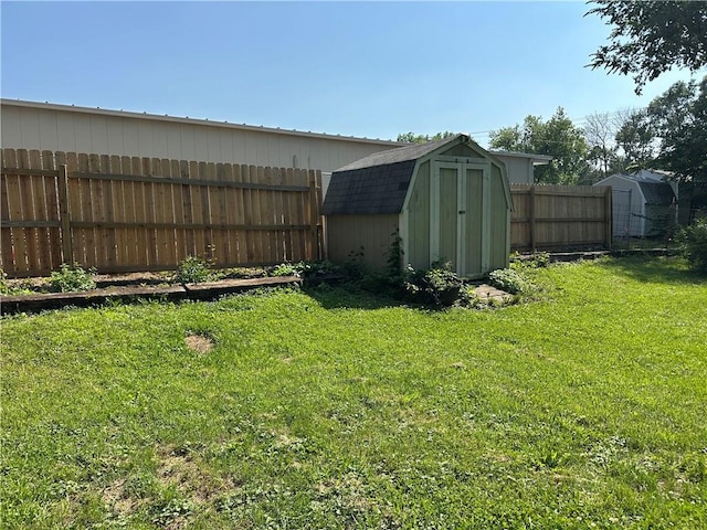 1915 W 5th St, Sedalia, MO 65301 - fenced backyard featuring a storage shed