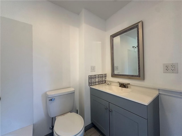 1915 W 5th St, Sedalia, MO 65301 - bathroom with toilet and vanity