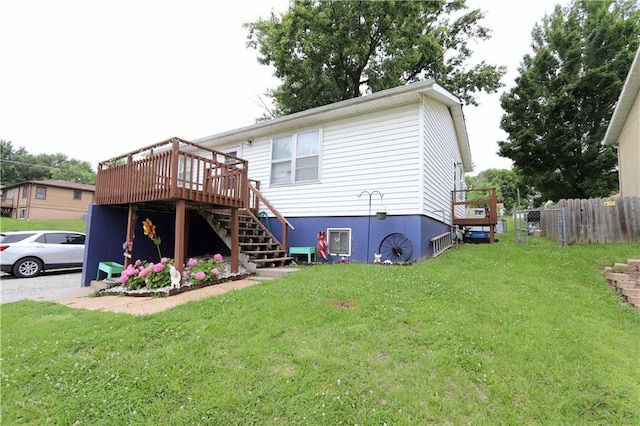 1429 S 6th St, Atchison, KS 66002 - rear view of house with stairway and a wooden deck