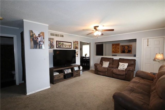 1429 S 6th St, Atchison, KS 66002 - carpeted living area with ceiling fan and crown molding