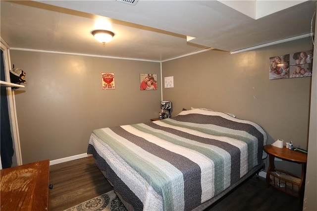 1429 S 6th St, Atchison, KS 66002 - bedroom featuring wood finished floors and baseboards
